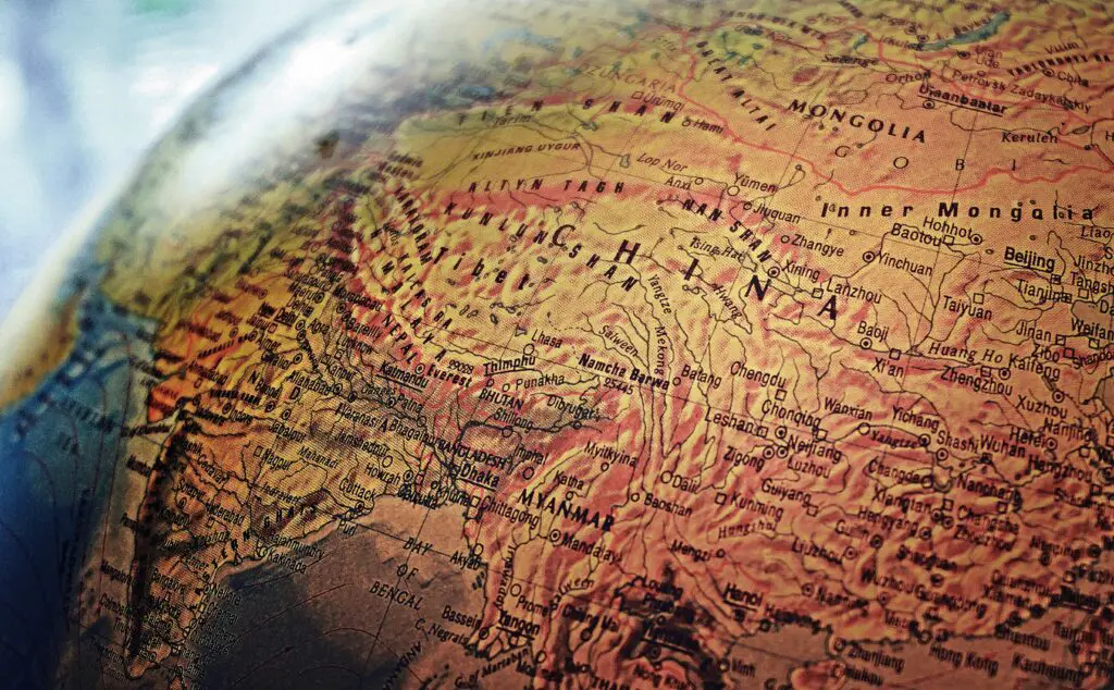 Explore the intricate details of China and neighboring regions in this vintage-style globe photo.